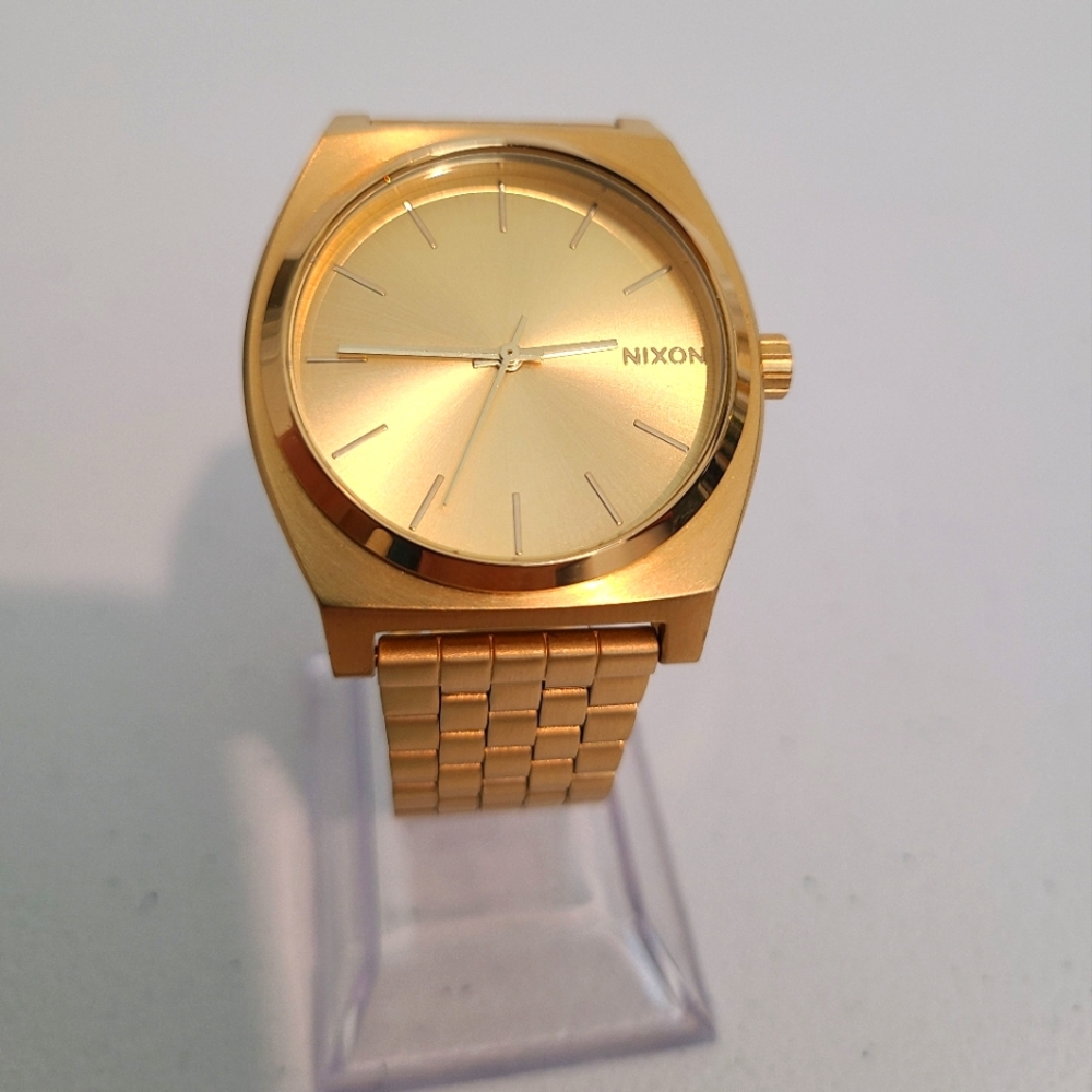 Nixon gold time teller